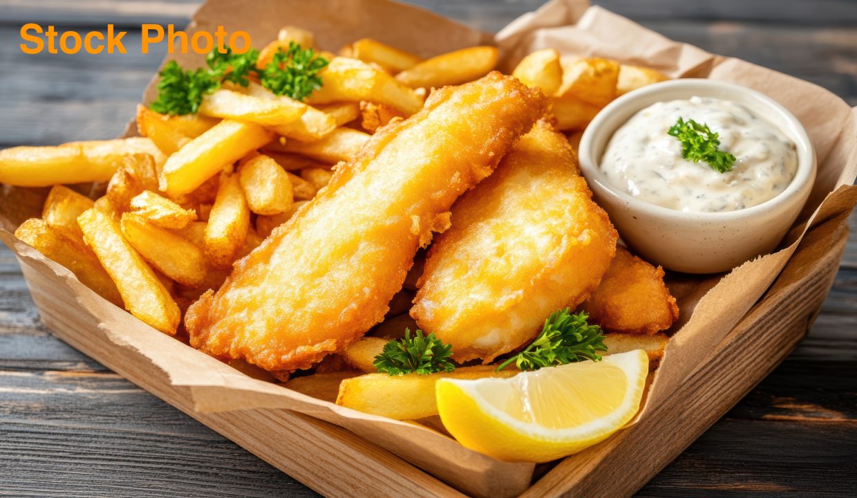 vecteezy_crispy-battered-fish-and-chips-served-with-tartar-sauce-and_69756302